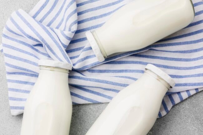 top-view-organic-milk-bottles-cloth